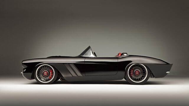 Sleek Black Chevrolet Corvette Classic Roadster Wallpaper For Car Enthusiasts