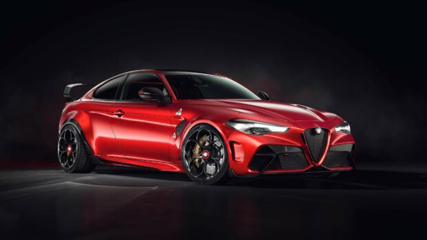 A red Alfa Romeo car with detailed rims and aerodynamic features is displayed on a dark background, 4K Desktop Wallpaper