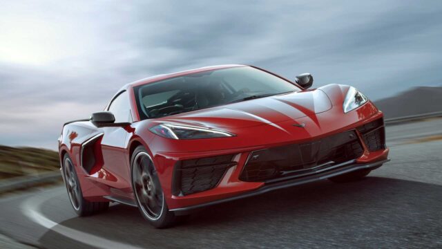 Sleek Red Chevrolet Corvette On Curvy Road High Resolution Wallpapers