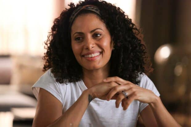 A woman with curly hair smiles warmly in a scene from A Million Little Things tv series, HD Desktop Wallpaper