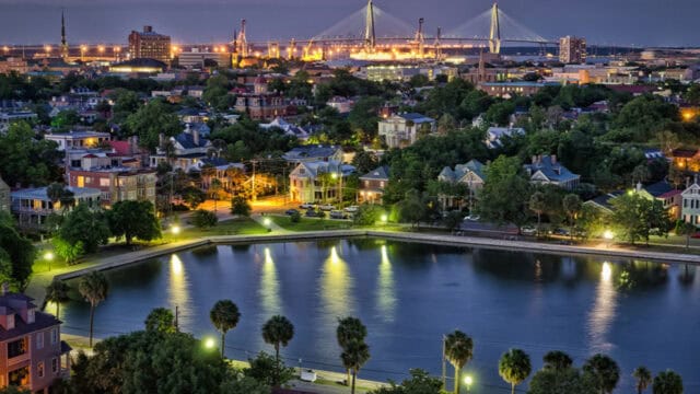 South Carolina Night Cityscape with Waterfront and Bridge Stunning Wallpaper