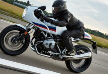A rider in full gear drives a Bmw R Nine T motorcycle along a countryside road, 4K Desktop Wallpaper