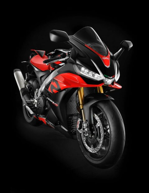 A red and black Aprilia motorcycle is showcased on a black background highlighting its sporty design, HD Mobile Wallpaper
