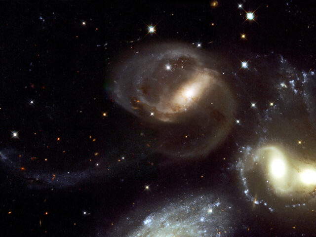 Stephans Quintet Cosmic Dance Captured In Stunning Wallpaper