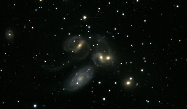 Stephans Quintet Cosmic Dance In Deep Space Wallpaper