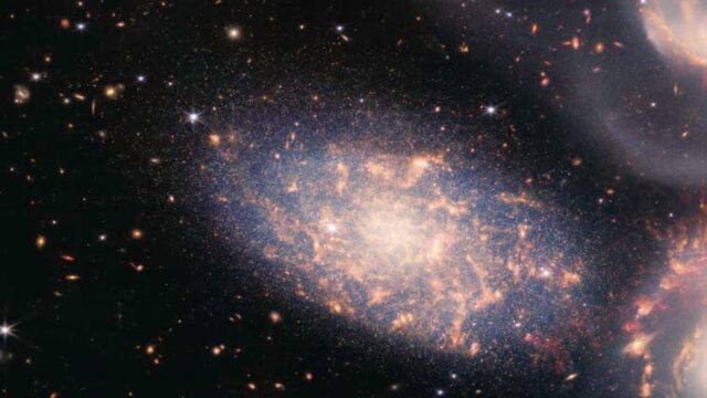Stephan's Quintet Cosmic Wallpaper Capturing Distant Galaxies