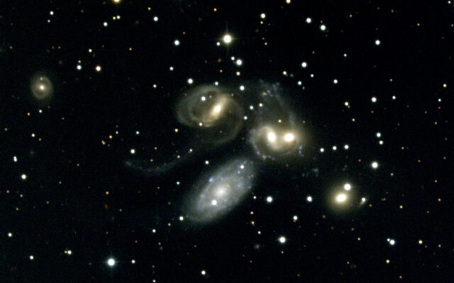 Stephan's Quintet Galaxies In Deep Space Wallpaper