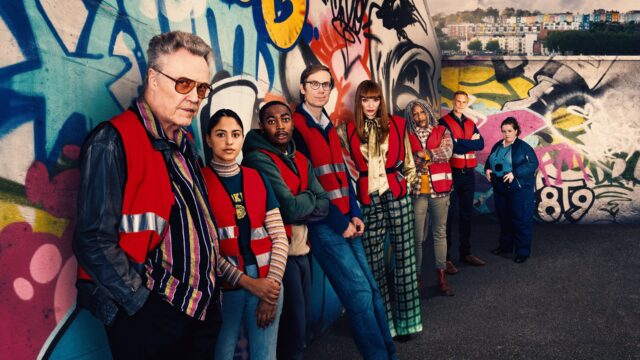 Stephen Merchant Wallpapers Group Photo with Colorful Graffiti Background and Red Vests
