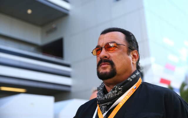 Steven Seagal Close Up Portrait with Sunglasses and Scarf Outdoor Wallpaper