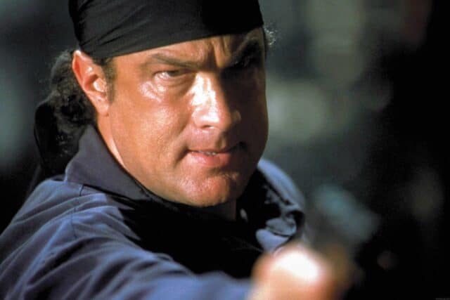 Steven Seagal Intense Close Up Action Scene Wallpaper
