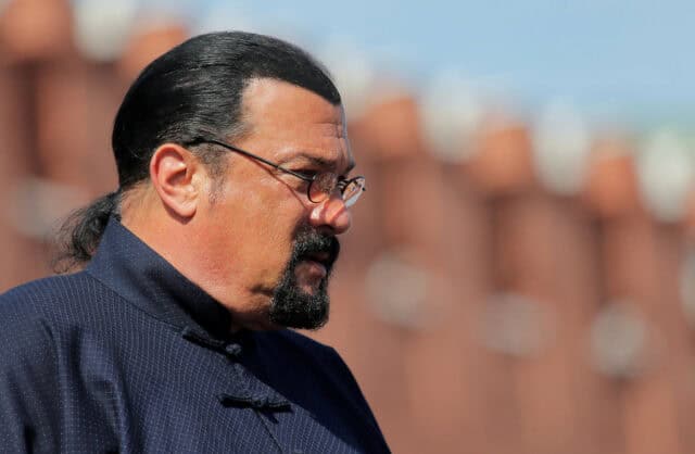 Steven Seagal Profile Close Up Side View in Traditional Outfit Wallpaper