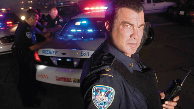 Steven Seagal as Sheriff with Police Cars and Officers Background Wallpapers
