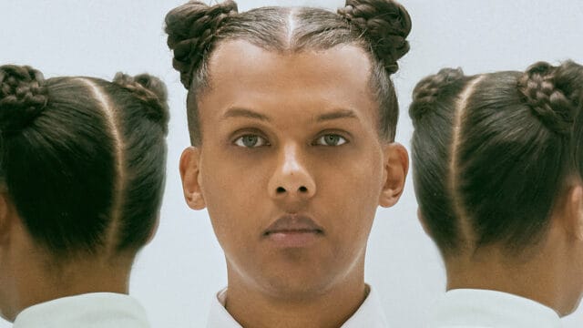 Stromae Wallpapers Close Up Portrait with Unique Braided Hairstyle and Reflective Effect
