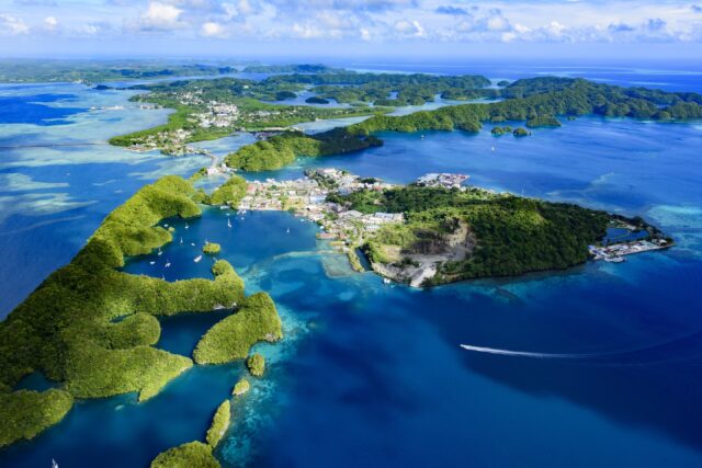 Stunning Aerial View Of Palau's Lush Islands And Blue Waters