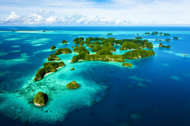 Stunning Aerial View Of Palau's Pristine Islands And Turquoise Waters