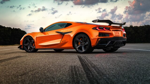 Stunning Orange Chevrolet Corvette Z06 On Open Road Chevrolet Corvette Wallpapers