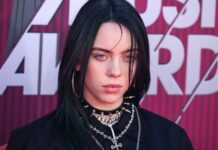 Stylish Black Spiked Choker and Layered Chains on Female Model Choker Wallpapers