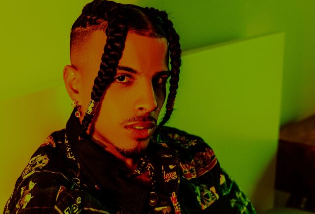 Stylish Rauw Alejandro Wallpaper In Vibrant Colors