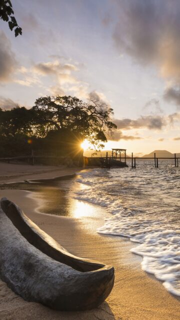 Sunset Serenity At Lake Malawi Beach Wallpaper