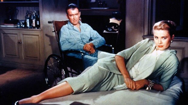 A man in a wheelchair and a woman reclining indoors capture a tense moment from an Alfred Hitchcock movie, HD Desktop Wallpaper