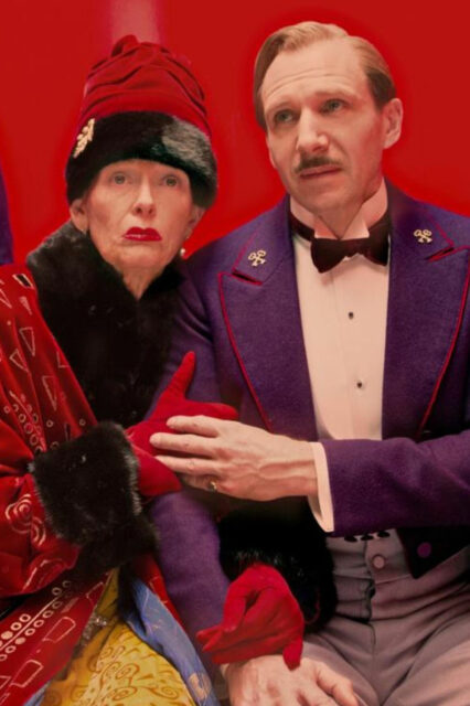 The Grand Budapest Hotel Characters in Colorful Vintage Costumes Wallpaper