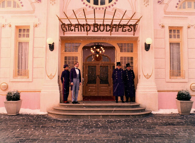 The Grand Budapest Hotel Entrance with Staff in Winter Snow Scene Wallpapers