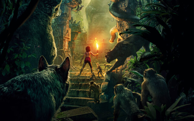 The Jungle Book Movie Wallpaper Mowgli Leading Animals with Torch in Ancient Jungle Ruins