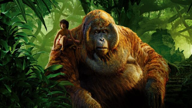 The Jungle Book Movie Wallpaper Mowgli Riding on King Louie in the Jungle