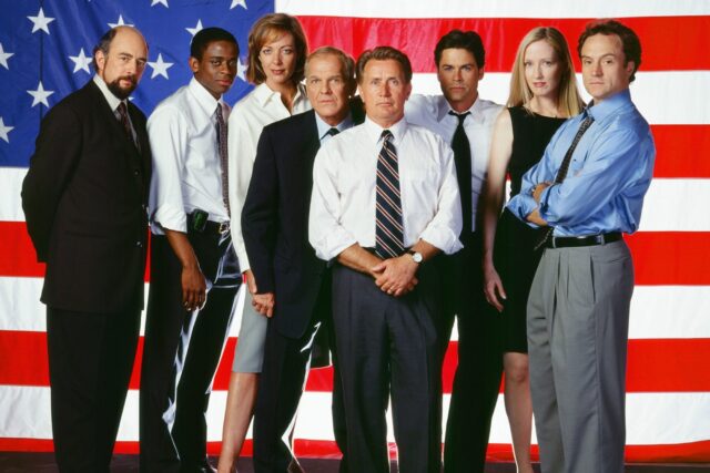 The West Wing TV Series Cast Group Photo with American Flag Background