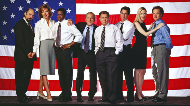 The West Wing TV Series Cast Group Photo with American Flag Background Wallpaper