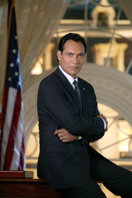 The West Wing TV Series Wallpaper Featuring Confident Political Figure in Suit
