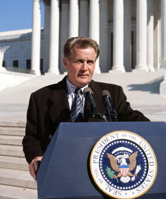 The West Wing TV Series Wallpaper President Speaking at Presidential Podium Background