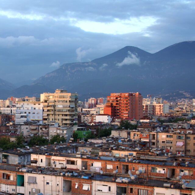 Tirana Albania Skyline With Mountain View Wallpaper