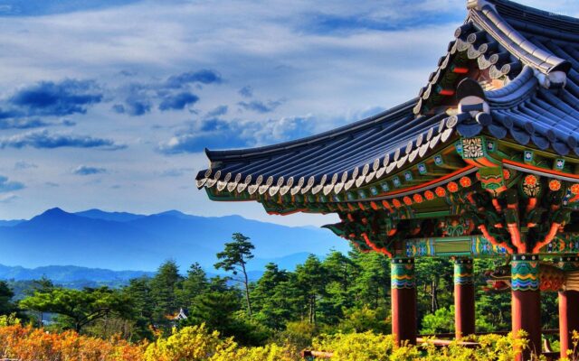 Traditional Korean Temple with Scenic Mountain Background