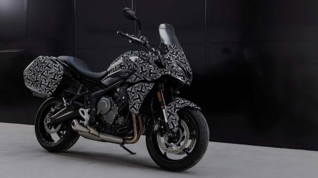 Triumph Tiger Sport 660 Motorcycle with Unique Black and White Patterned Camouflage Wallpaper