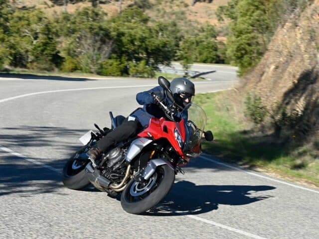 Triumph Tiger Sport 660 Riding on Curvy Mountain Road Wallpaper (1)