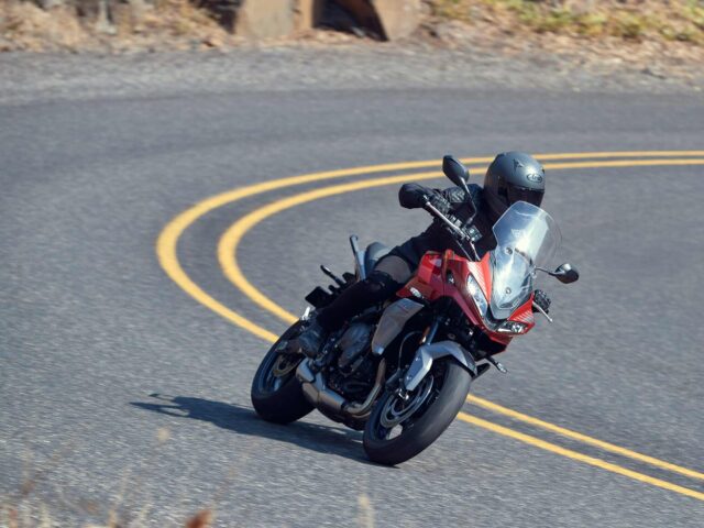 Triumph Tiger Sport 660 Riding on Curvy Mountain Road Wallpaper