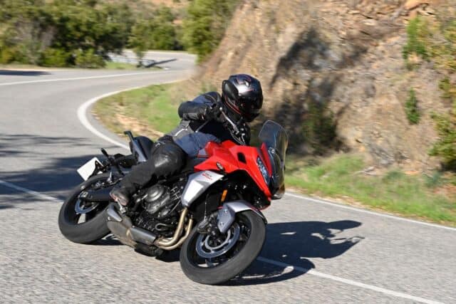 Triumph Tiger Sport 660 Riding on Mountain Road Wallpaper