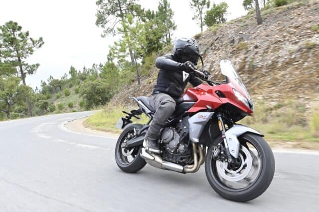 Triumph Tiger Sport 660 Riding on Scenic Mountain Road Wallpaper (1)