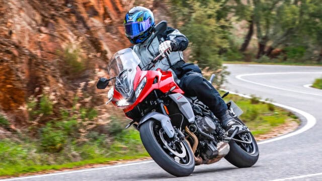 Triumph Tiger Sport 660 Riding on Winding Mountain Road Wallpaper
