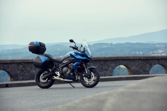 Triumph Tiger Sport 660 in Blue on Scenic Mountain Road Wallpaper