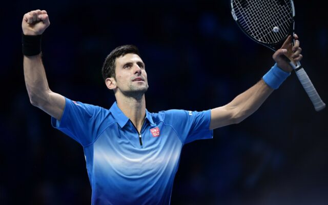 Triumphant Novak Djokovic Celebrating Victory Wallpaper