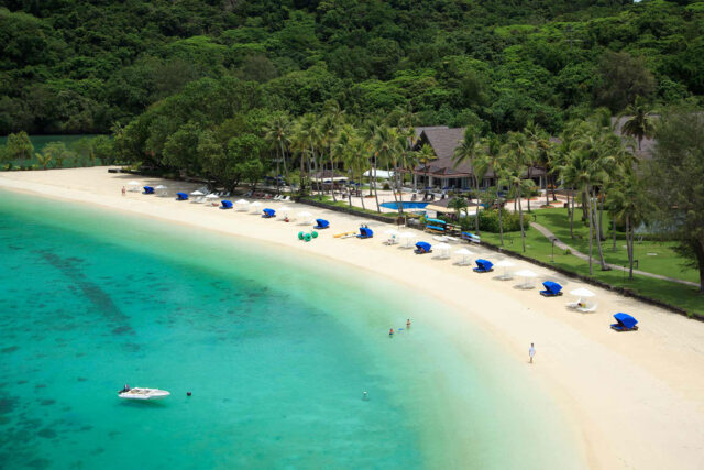 Tropical Paradise Beach In Palau With Turquoise Waters And White Sand