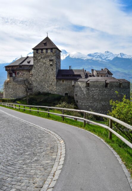 Vaduz Castle Scenic View With Snowy Mountains Background