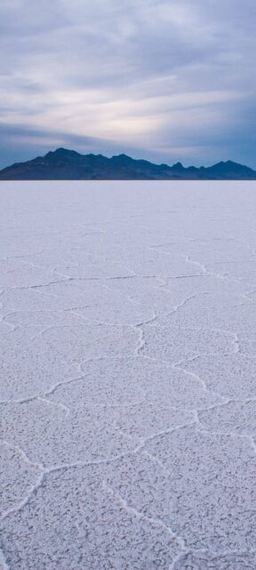 Vast Salar De Uyuni Salt Flats with Mountain Background Bolivia Wallpaper