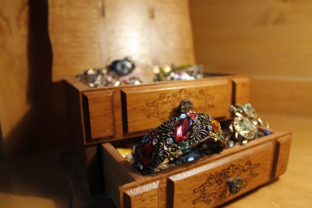 Vintage Jewelry Box With Elegant Bracelets Wallpaper