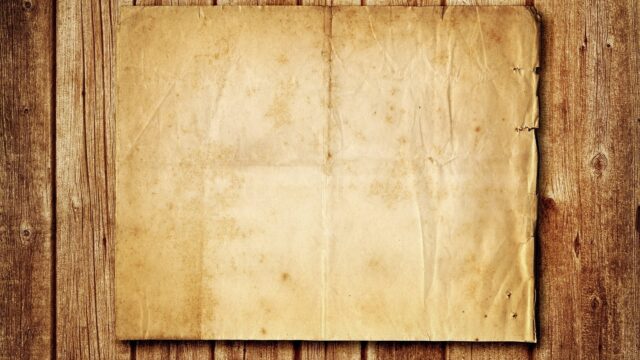 Vintage Paper Texture on Rustic Wooden Background