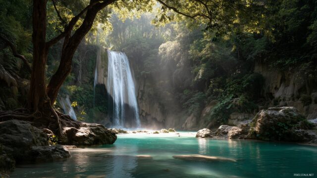 Waterfall Wallpaper HD For Desktop Computer, Majestic Waterfall Plunging Into A Crystal Clear Pool With Sunlight Filtering Through The Trees
