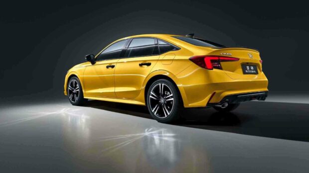 A yellow Honda Integra is showcased from the side against a dark background, highlighting its sleek design and sporty features, HD Desktop Wallpaper