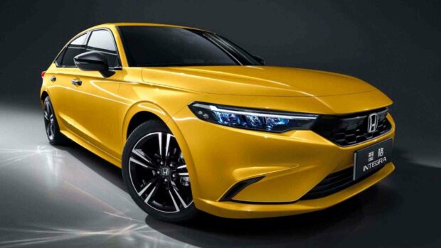 A sleek yellow Honda Integra is shown from the front with detailed headlights and black rims, HD Desktop Wallpaper